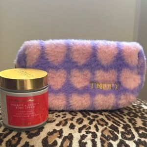 TRULY brand body cream and zipped cosmetic bag.